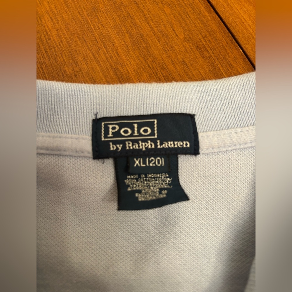 Baby blue with yellow polo logo
